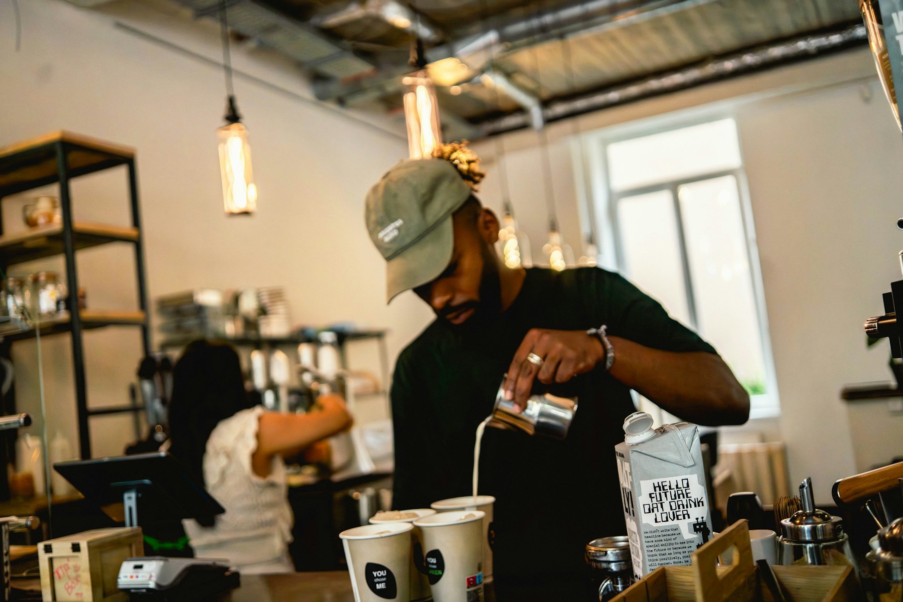 A barista preparing coffee